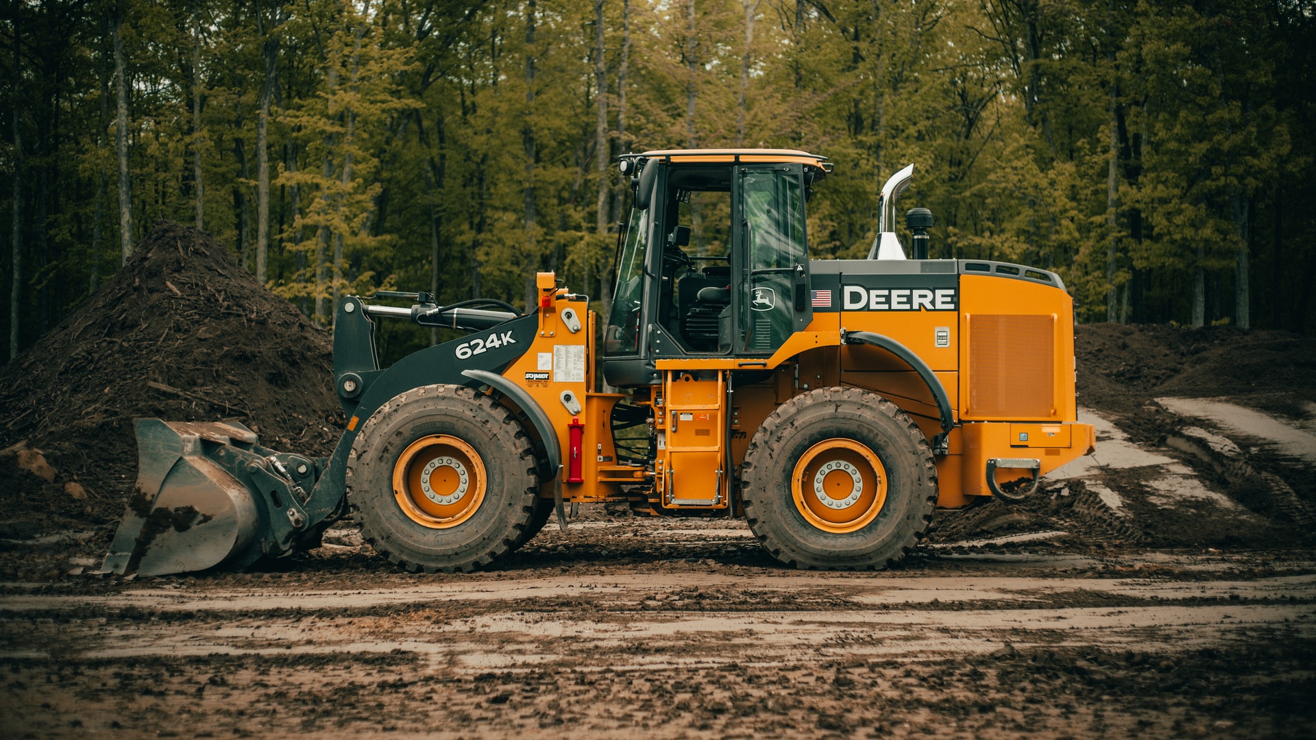 tractor working on a driveway