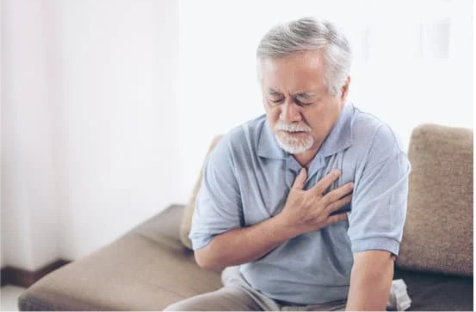 Older man heart attack on couch